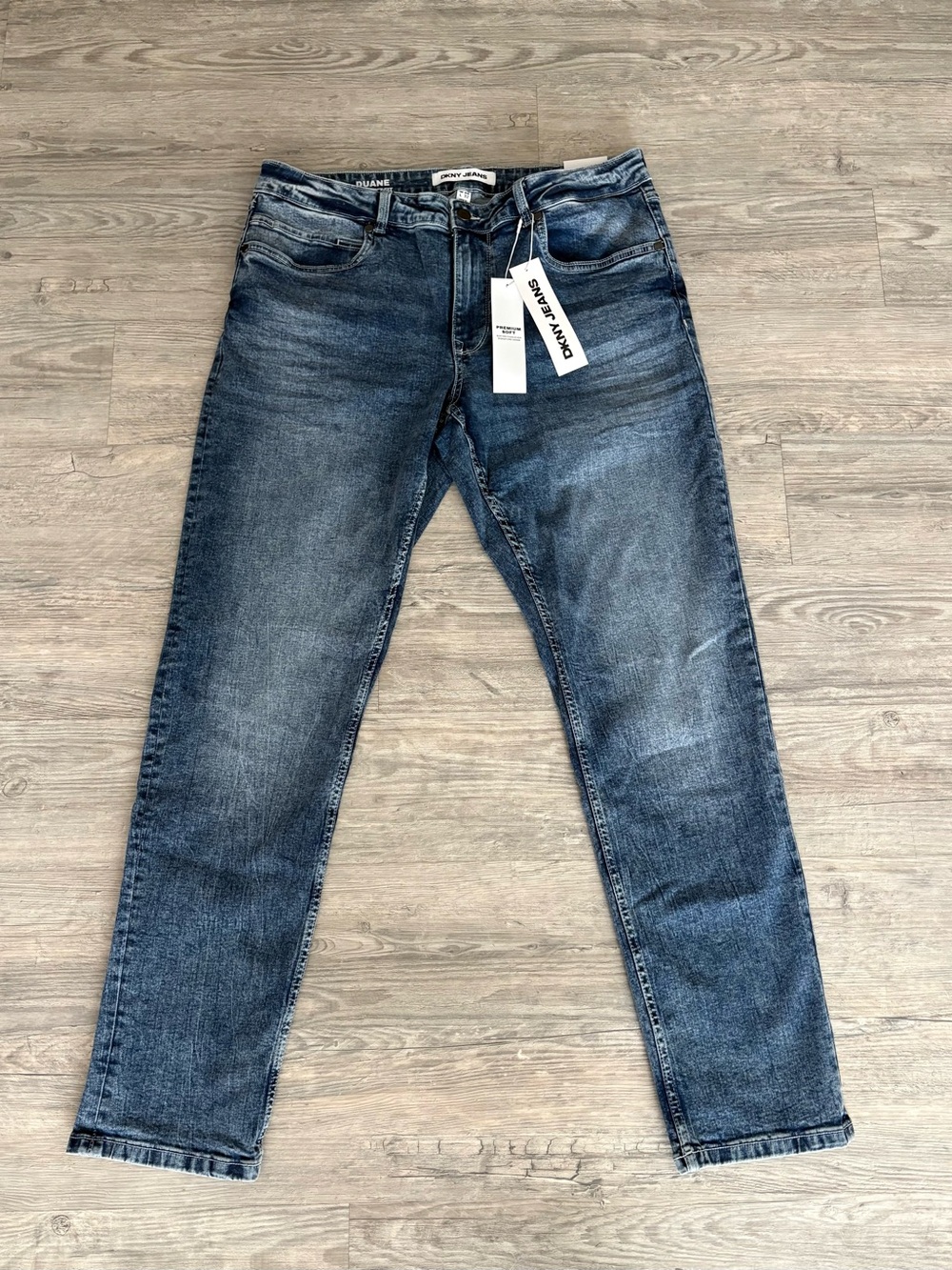 DKNY Men’s Slim Straight Jeans in Washed Blue